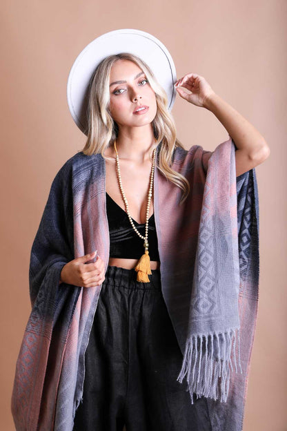 Leto Collection western serape tassel shawl in earthy tones, perfect for layering and stylish outfits