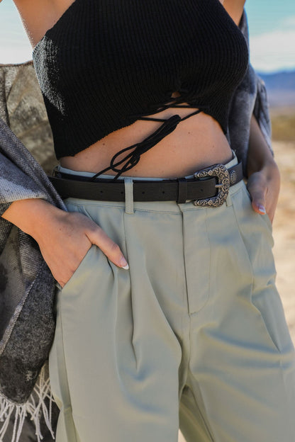Leto Collection western style fashion belt paired with high-waisted trousers for a trendy look